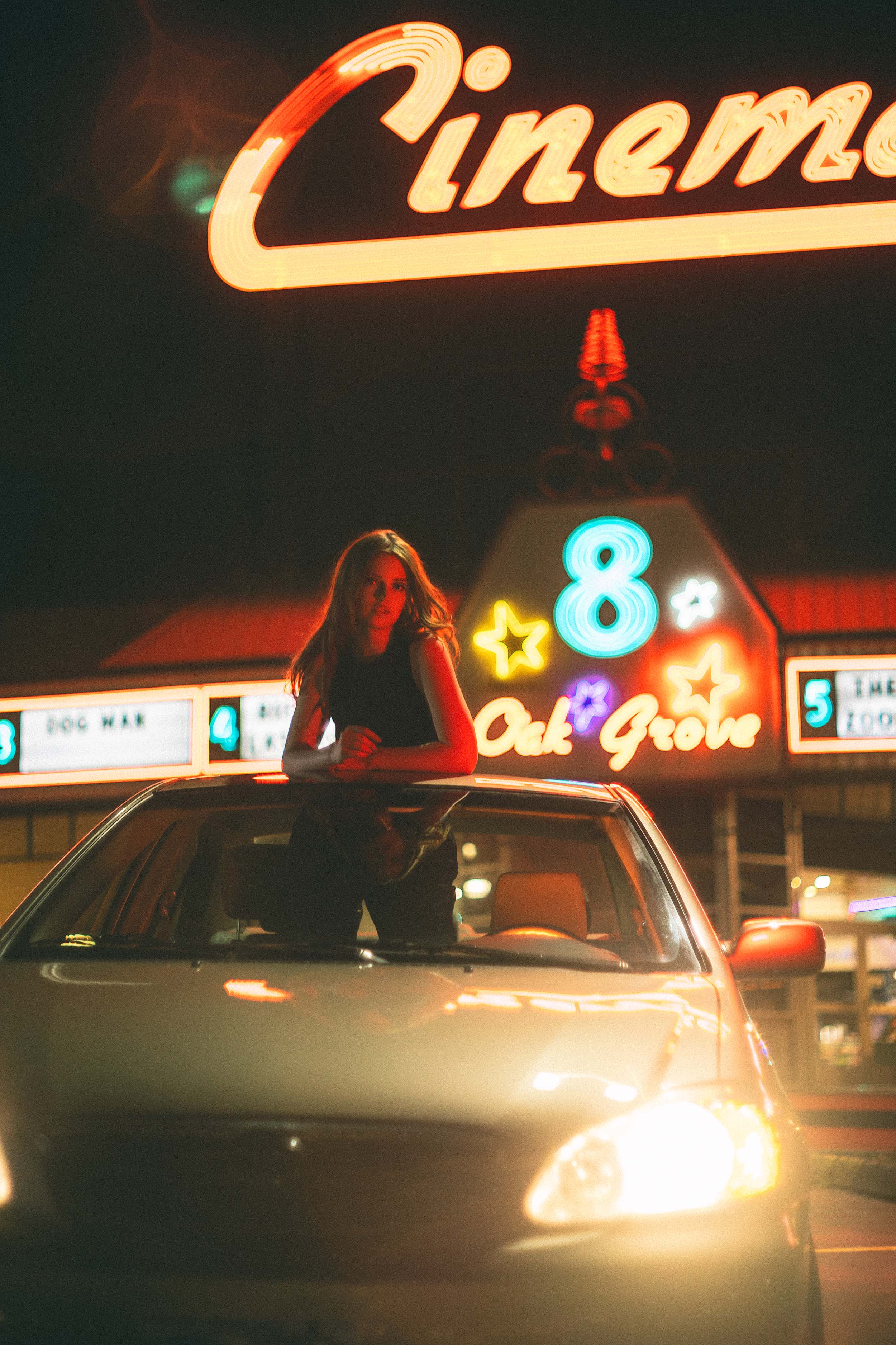 Cinematic Portraits with Vintage Flair by a Movie Theater — photograph 21 of 35